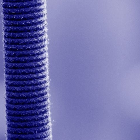 purple grip on a javelin on a purple background