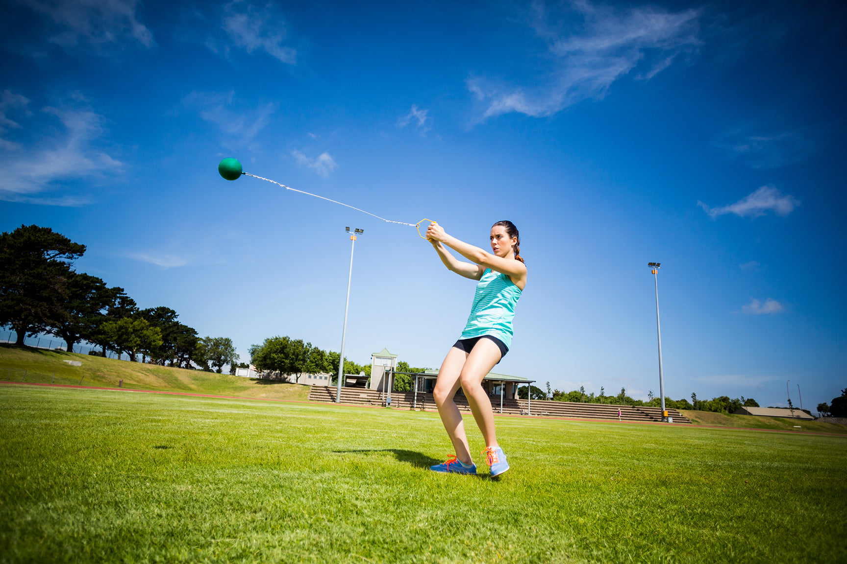 Female athlete throwing the hammer