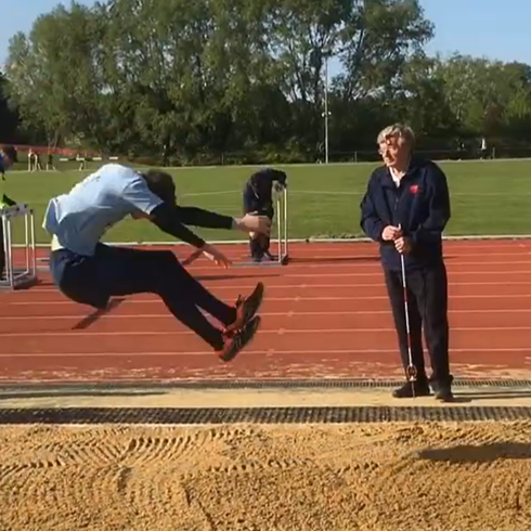 UK U17 Triple jumper and long jumper Thomas Hufford hanging a long jump