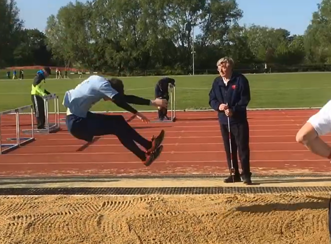 UK U17 Triple jumper and long jumper Thomas Hufford hanging a long jump