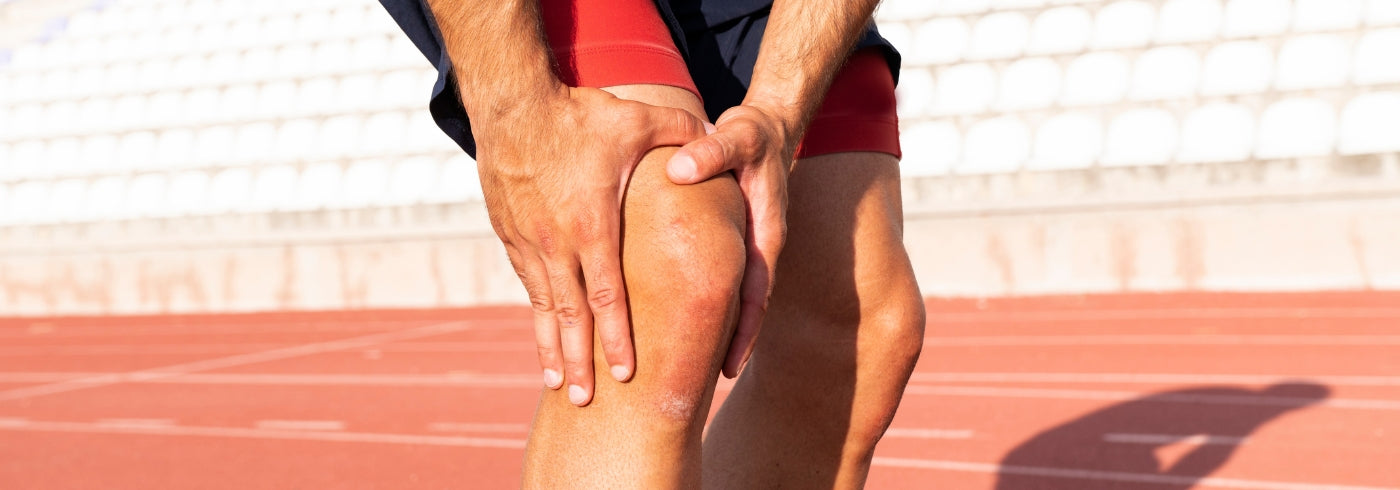 Male Athlete with Knee Injury