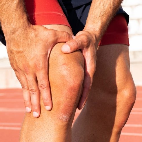 Male Athlete with Knee Injury