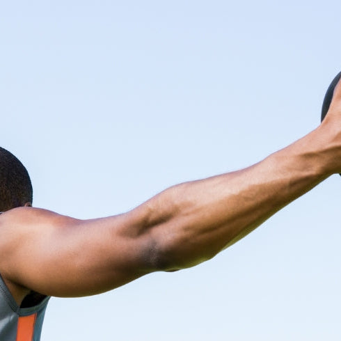 Male Athlete Throwing Discus