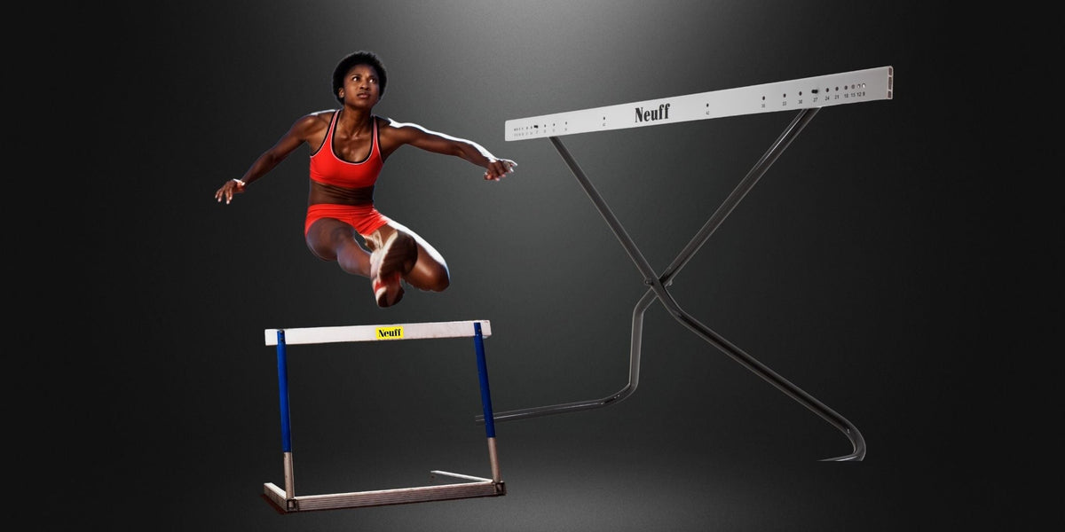 Female hurdles athlete jumping over Neuff hurdles