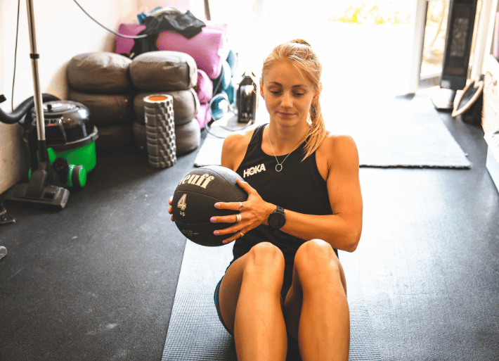 Athlete training with a 'Neuff' medicine ball 