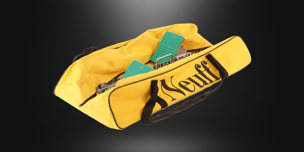 Green classic starting blocks in yellow Neuff starting block bag