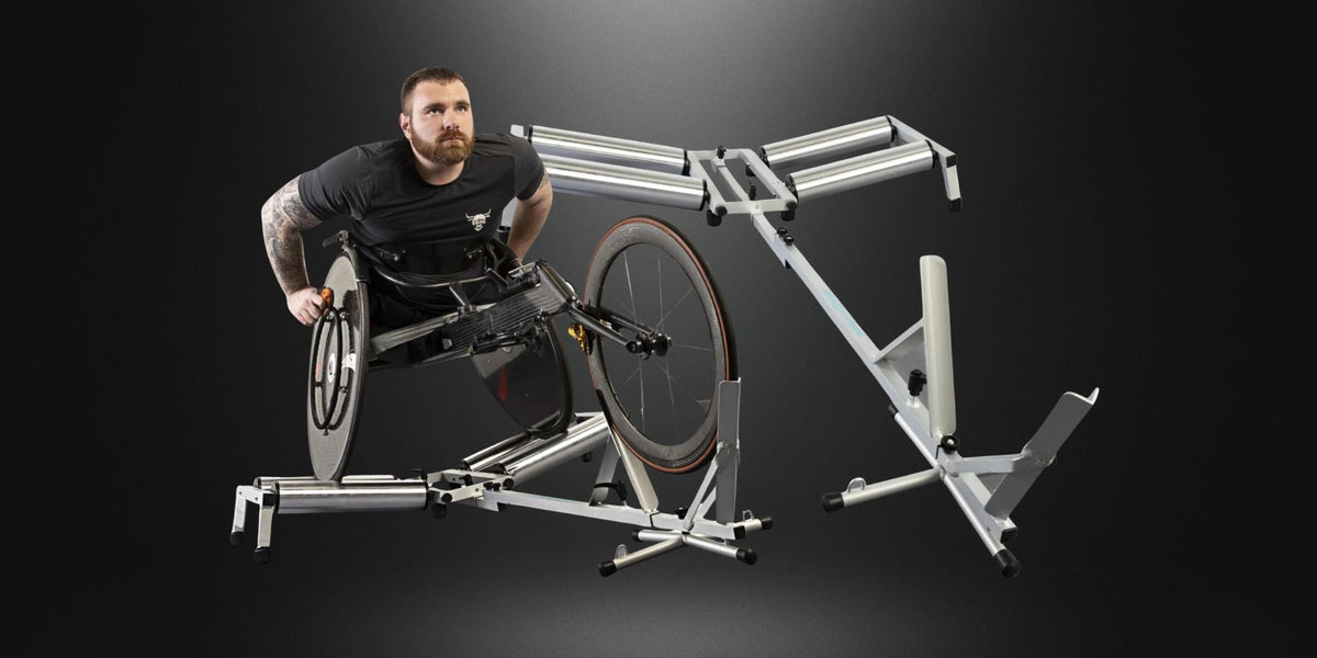 man sat in a wheelchair on a rolling road