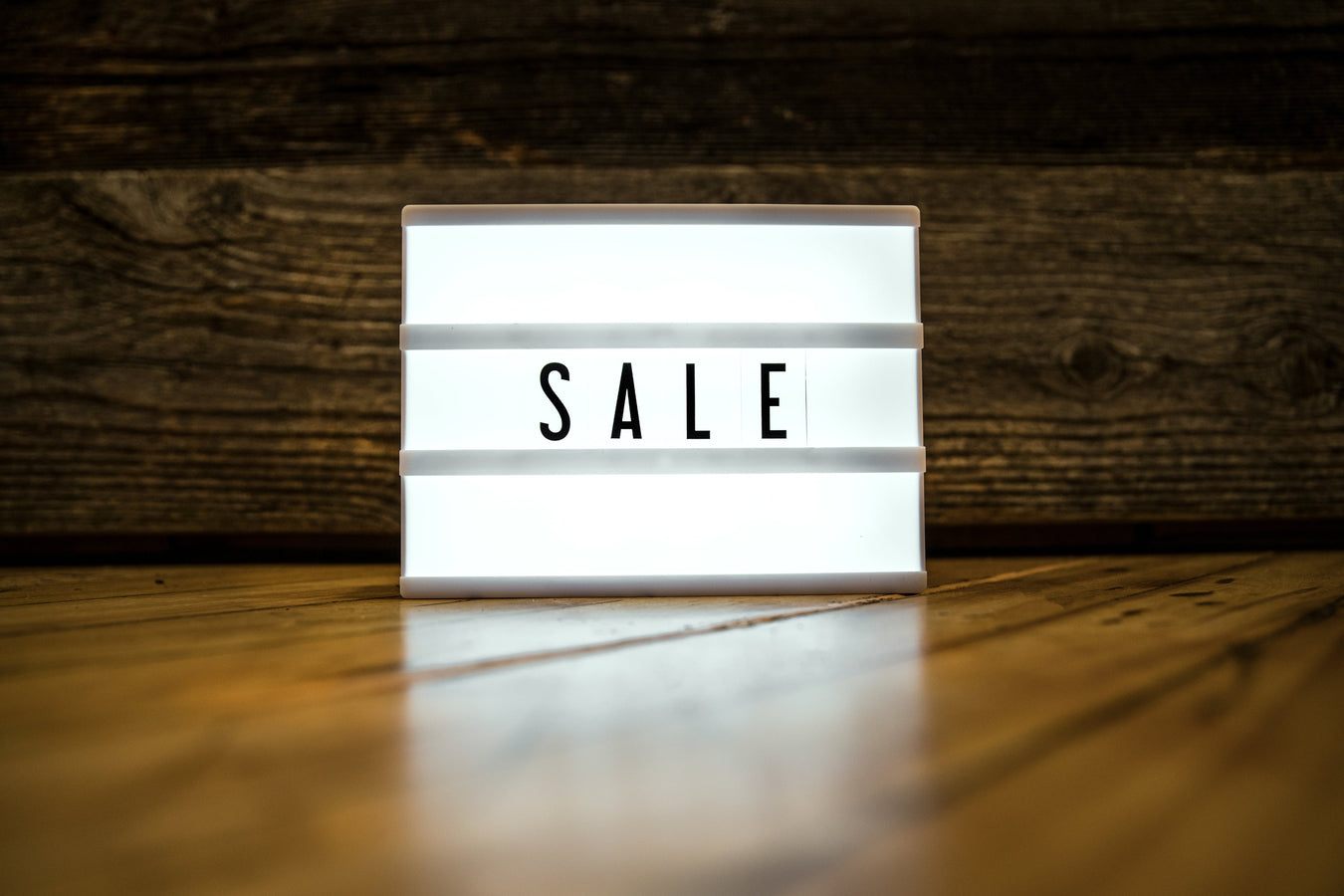 Glowing 'Sale' sign