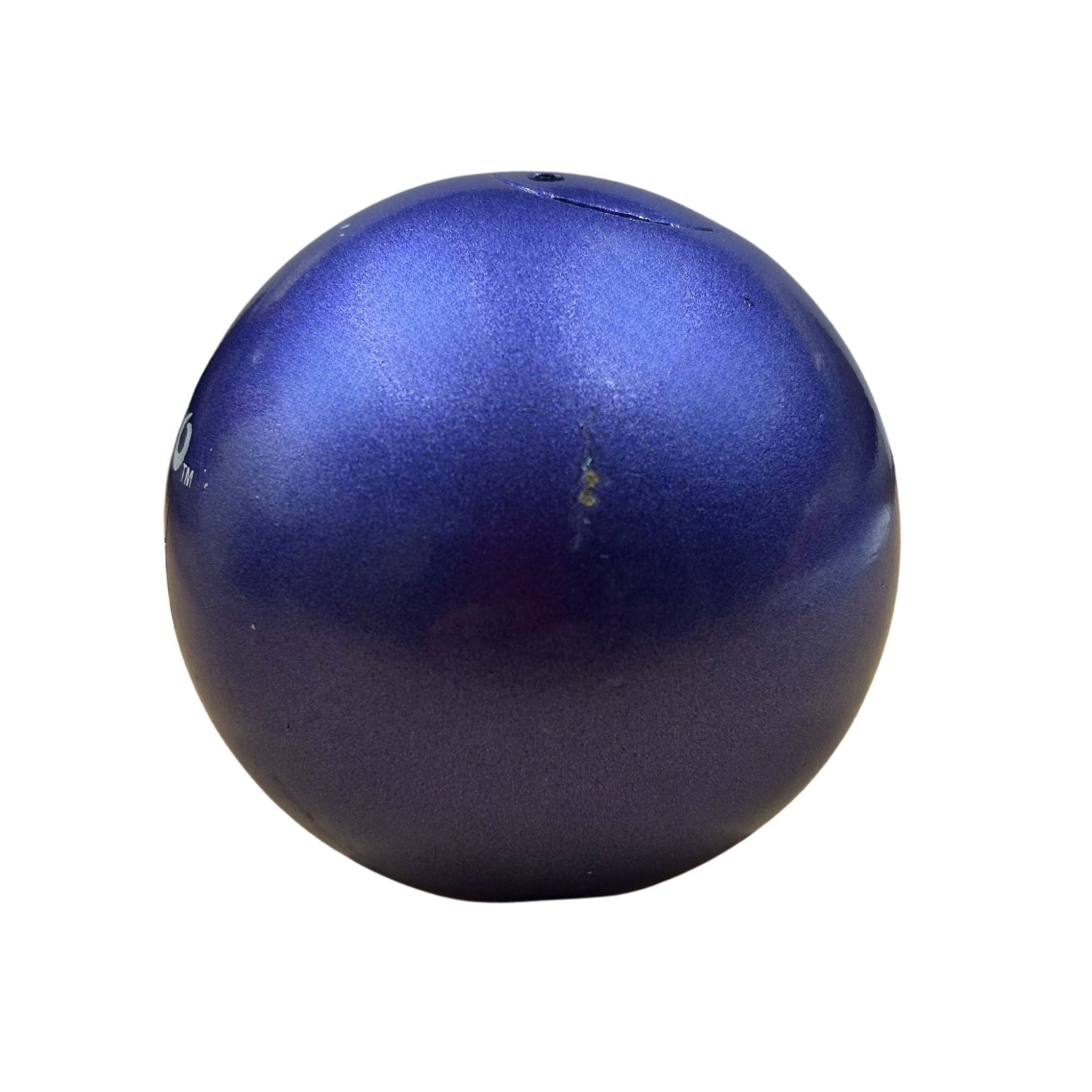 purple ball, shot put showing slight paint damage on a white background