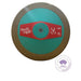 A circular Nordic Sport 2KG discus on a white background, featuring a metallic bronze outer ring, a teal center, and a red label with white text.