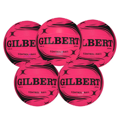 Five bright pink Gilbert Control Ball netballs arranged in a 2x3 cluster on a plain white background. Each ball features the brand name 'GILBERT' in bold black letters, along with 'CONTROL A BALL' and 'NETBALL' text.