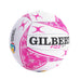 A Gilbert Fizz Netball on a solid white background, featuring a white textured leather surface with vibrant pink graphic patterns and black branding.