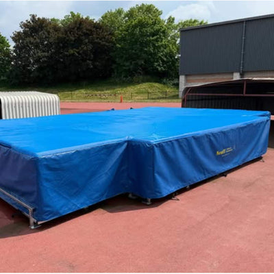 Blue High Jump landing area with Neuff branding on a steel pallet frame base 