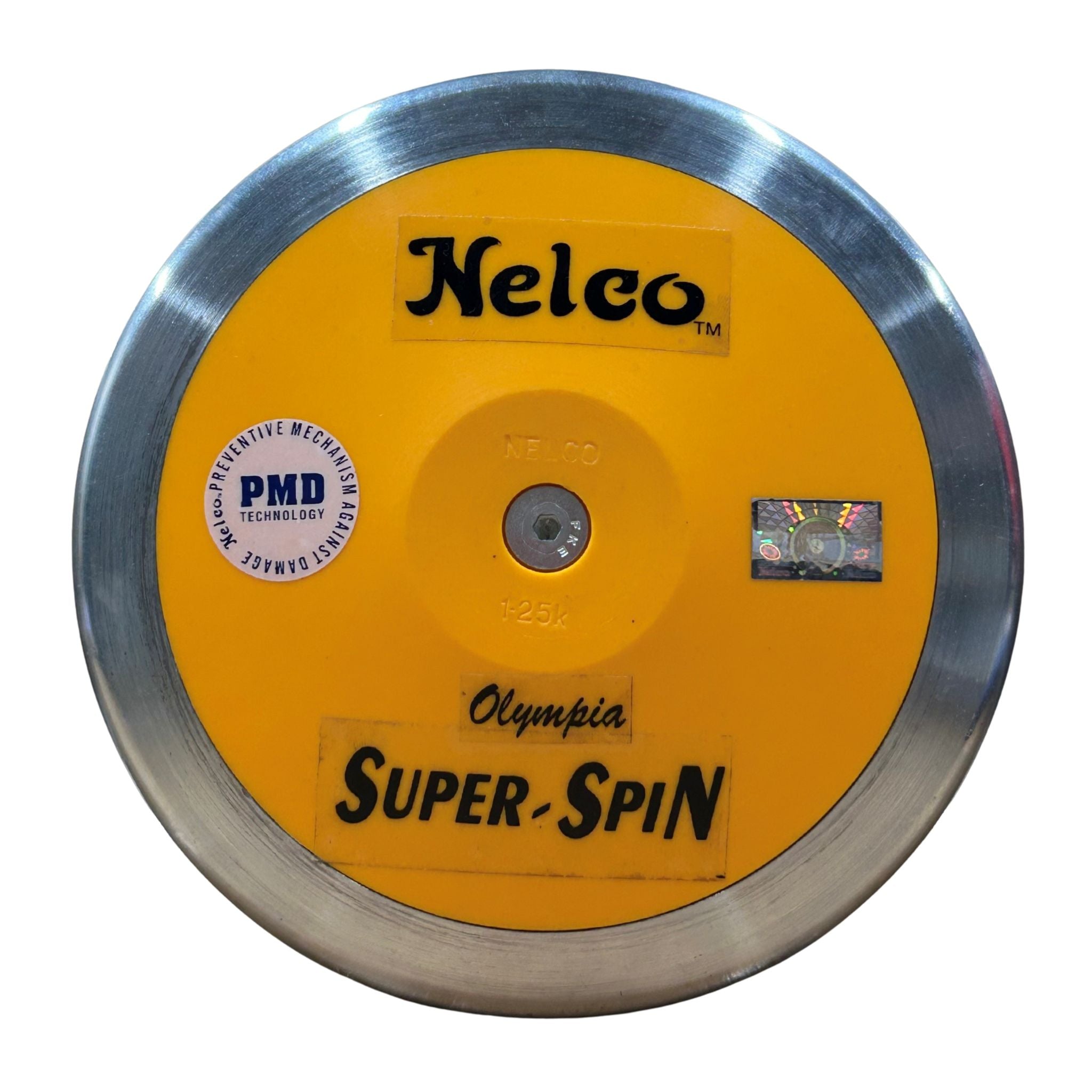 A Nelco Olympia Super-Spin discus with a bright yellow centre, a polished silver metal rim, and black branding text, shown on a plain white background.