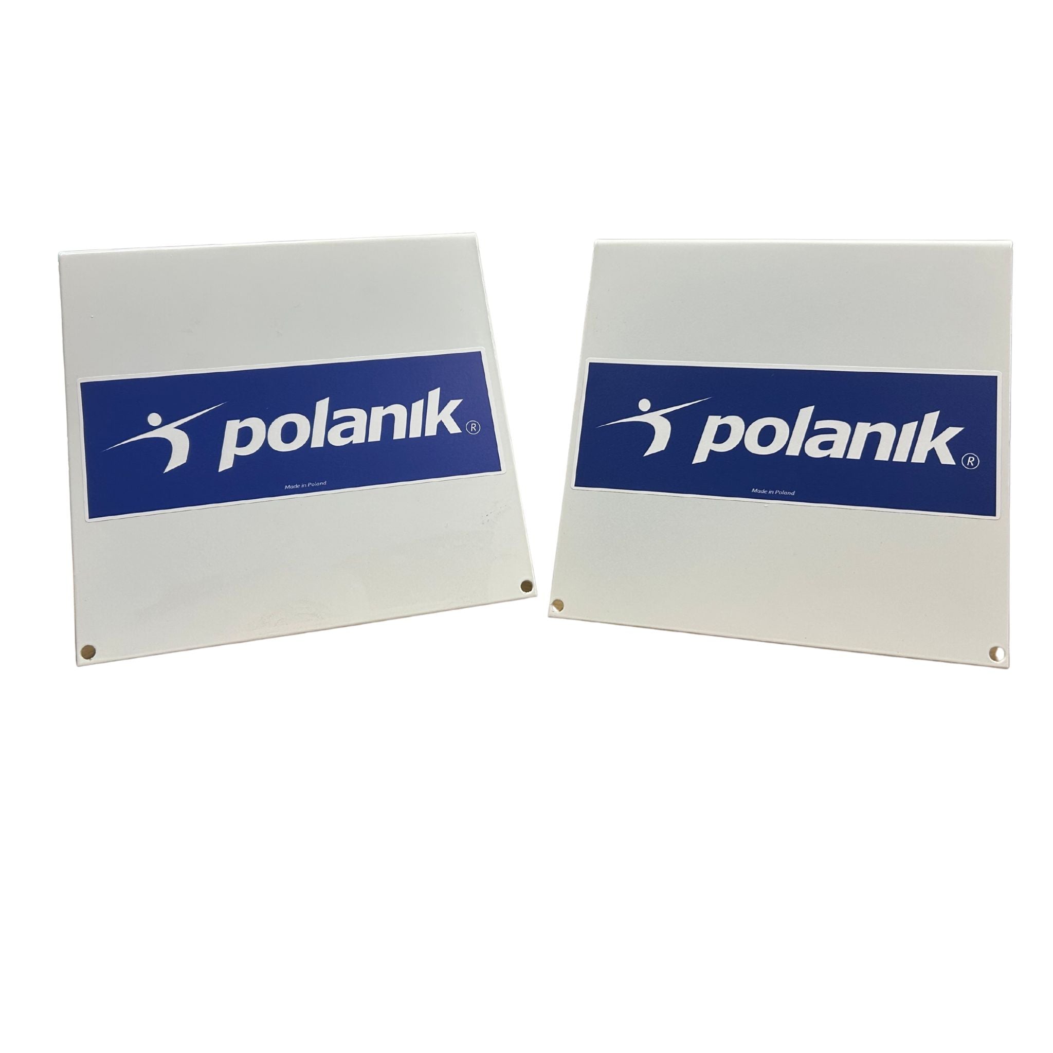 white metal pyramid with polanik written on