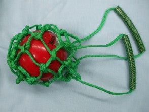 Green knotted net bag with plastic tube handles to carry a shotput (not included)