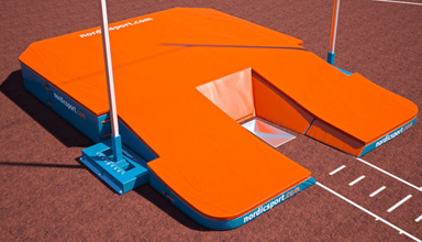 Pole Vault Landing Pit | Nordic World 4 Landing area | Installed at a track with pole vault uprights and trough.